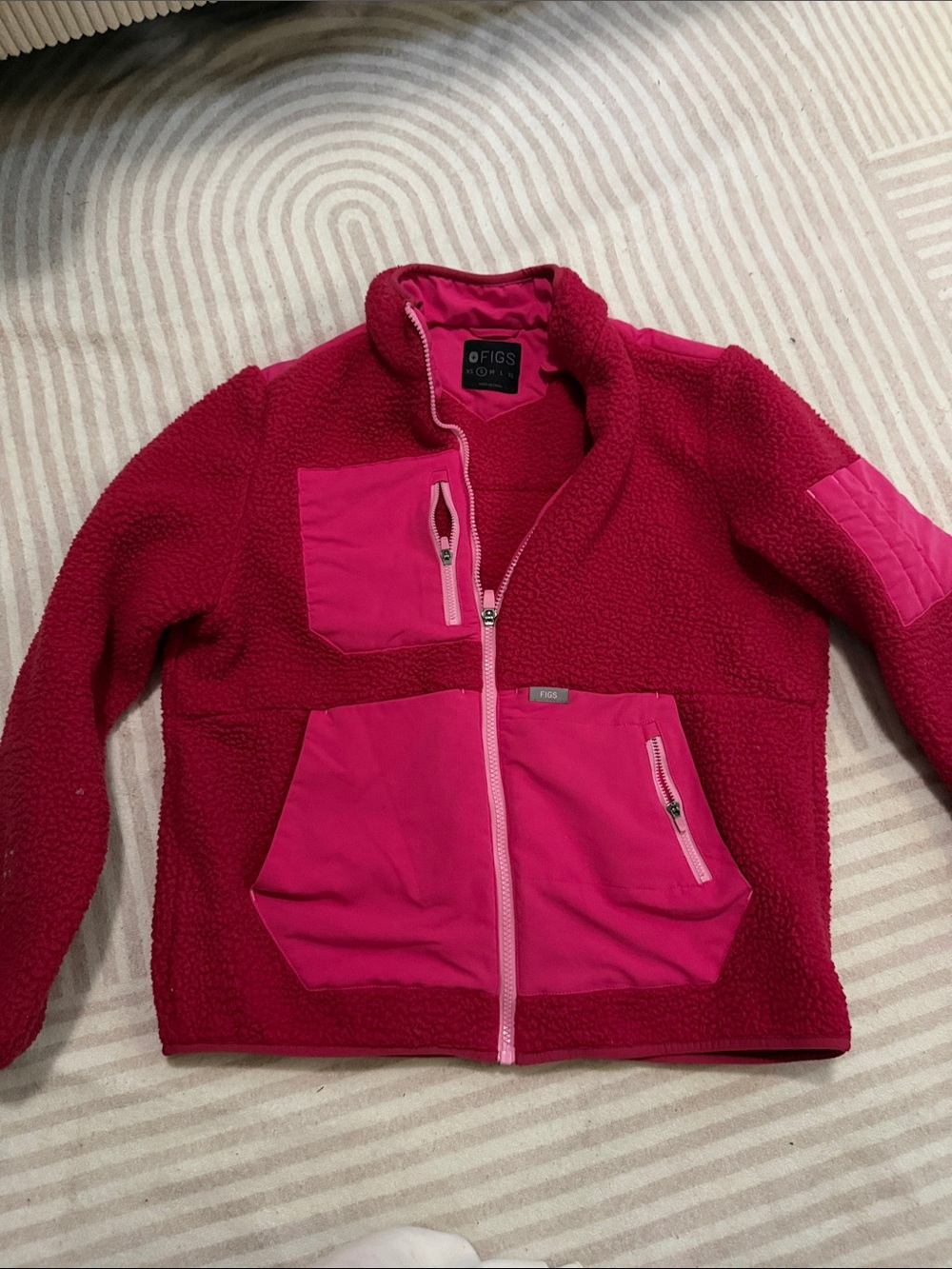 Figs womens' Puffer-Style Sherpa Jacket in Deep Red with Bright Pink Pockets